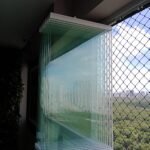 Imagem dos paineis de uma cortina de vidro.